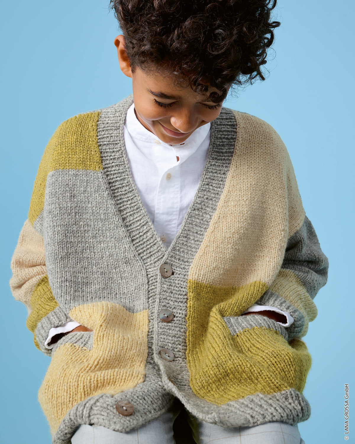 Lana Grossa Kids Nr. 15 model 18 - vest met Cool Merino - sfeerfoto 3