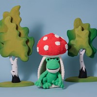 Kikker in Paddenstoel - Yarnzoo Garen- en Haakpakket | Wolplein.nl